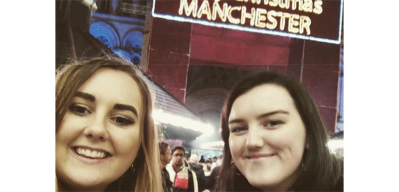 Two students at the Christmas markets