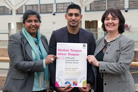 Left to right: Project manager Yasmin Hussain, boxer Amir Khan and Dean of Humanities at MMU Dr Sharon Handley launch the competition Mother Tongue Other Tongue at Manchester Metropolitan University