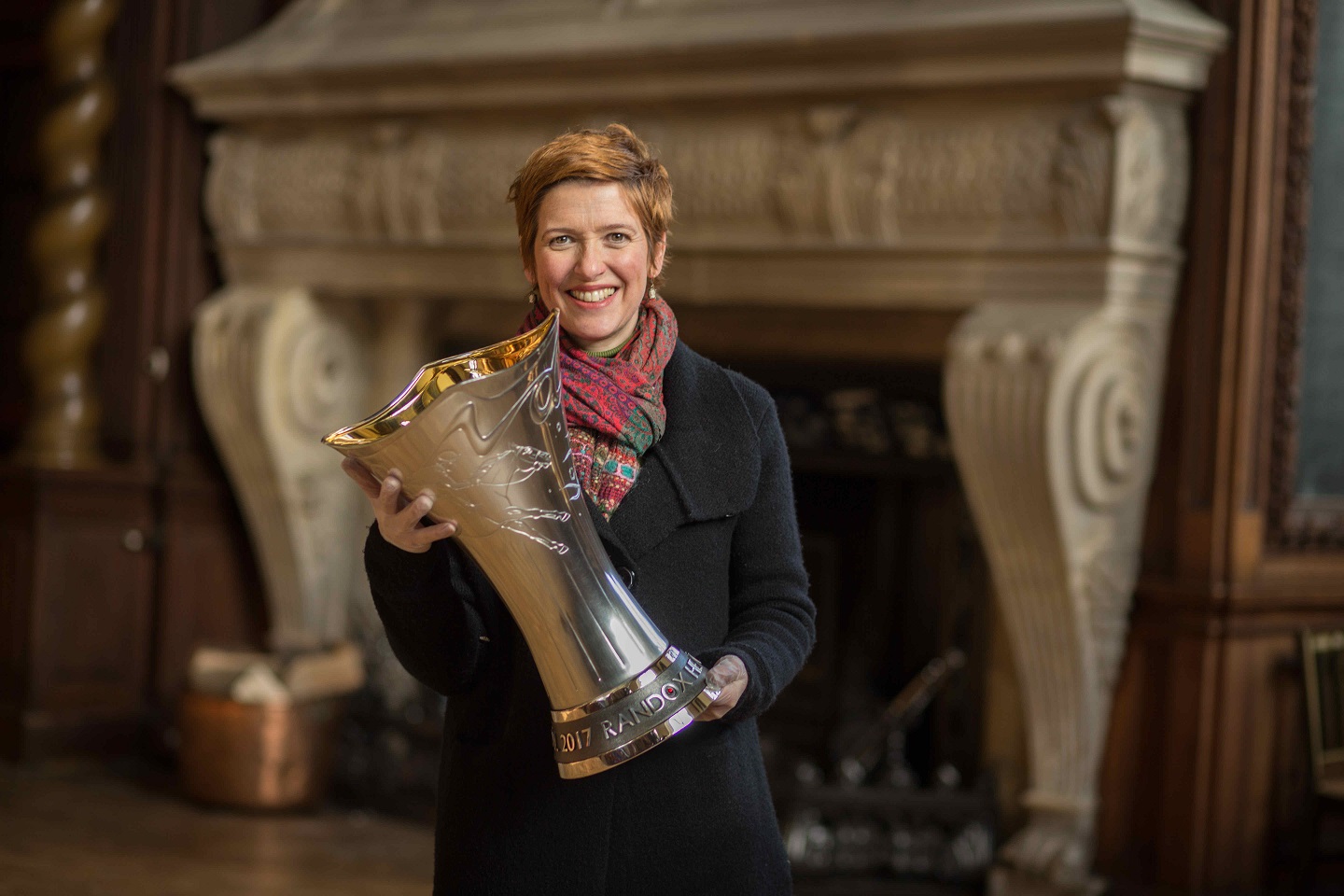 Shannon O'Neill and her Grand National Trophy. Pic: Adrian Salisbury