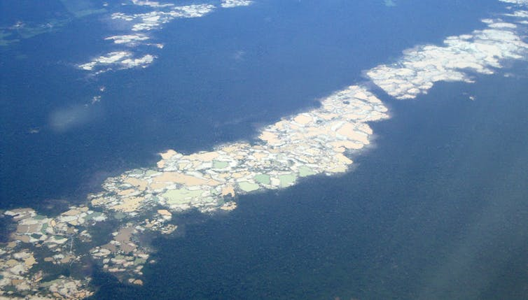 Aerial view of gold mining operations in the Madre de Dios. Mining has affected watersheds across the region