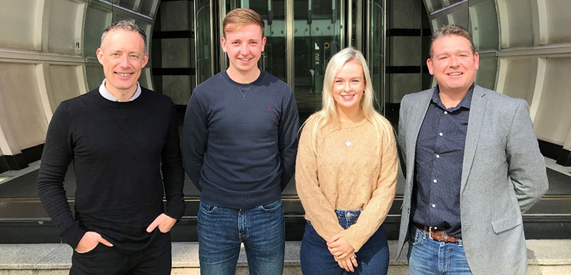 Jeff McCarthy (left) and Craig Johnson (right) with students Dan Carr and Claudia Farrington