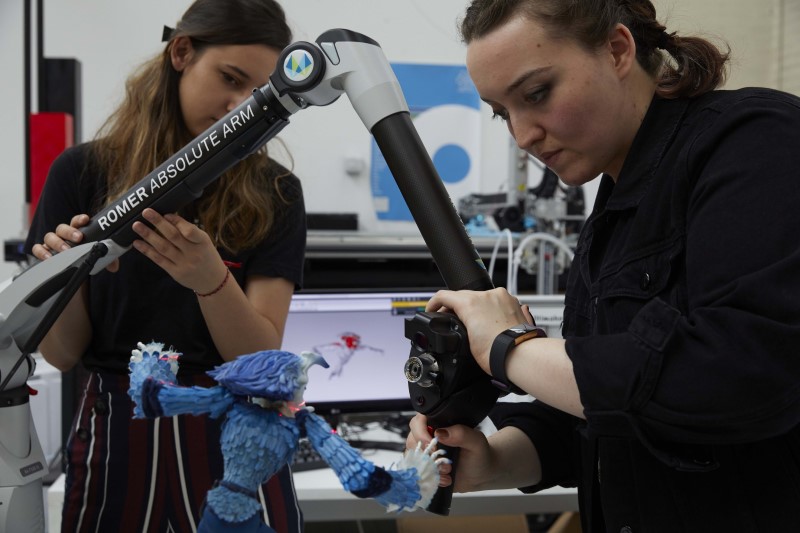 Diana Kasavetova, left, and Chelsea Hicks scan The Sandman from Mackinnon and Saunders' 1992 short of the same name