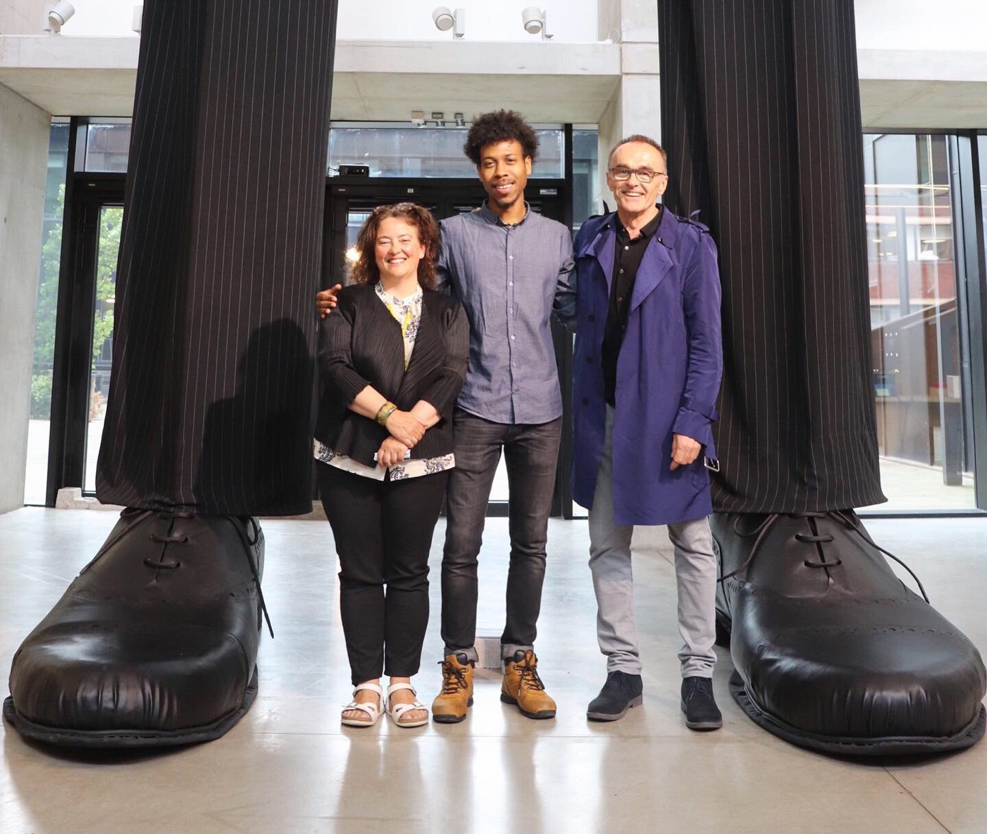 Penny Macbeth, Deputy Faculty Pro-Vice Chancellor and Dean of Manchester School of Art, with recent graduate and glassblower, Jahday Ford, and film director, Danny Boyle, at the Degree Show launch night