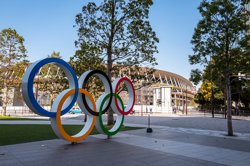 The Olympic Games logo statue in front of the Tokyo Museum and the new national stadium. Pic: Joseph Oropel / Shutterstock.com