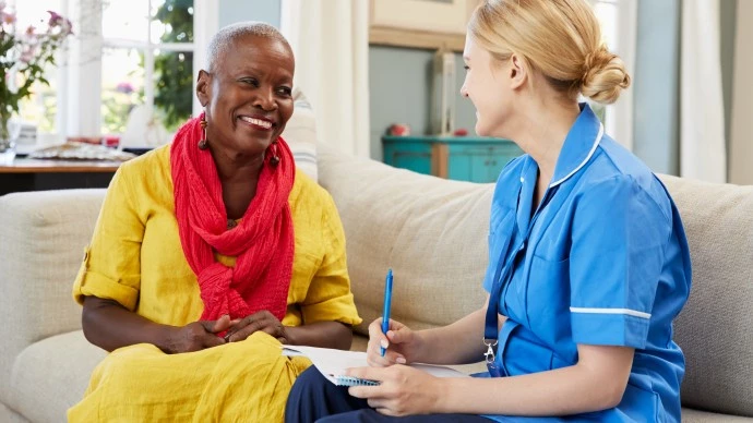 Image of community nurse and patient 