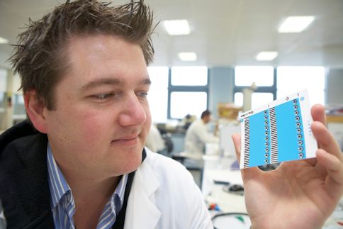 Professor Craig Banks with an electrochemical sensor 