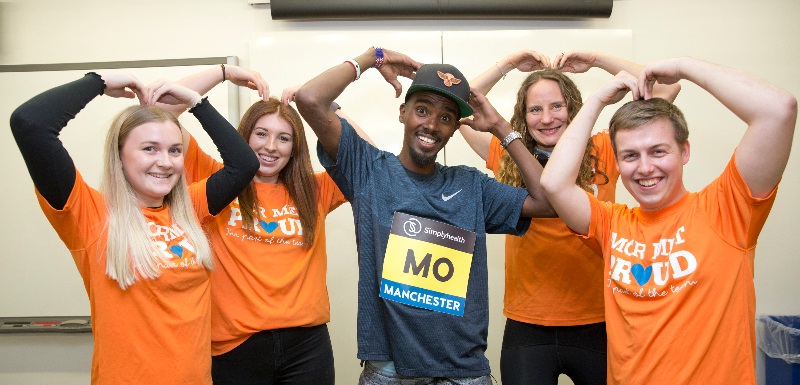 Sir Mo Farah meets some members of Team Orange