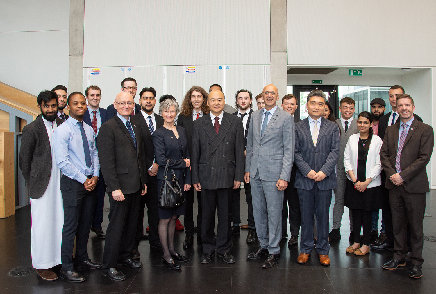 Consul General Dr Sun Dali of the Consulate General of the People’s Republic of China in Manchester with Manchester Metropolitan staff and scholarship students